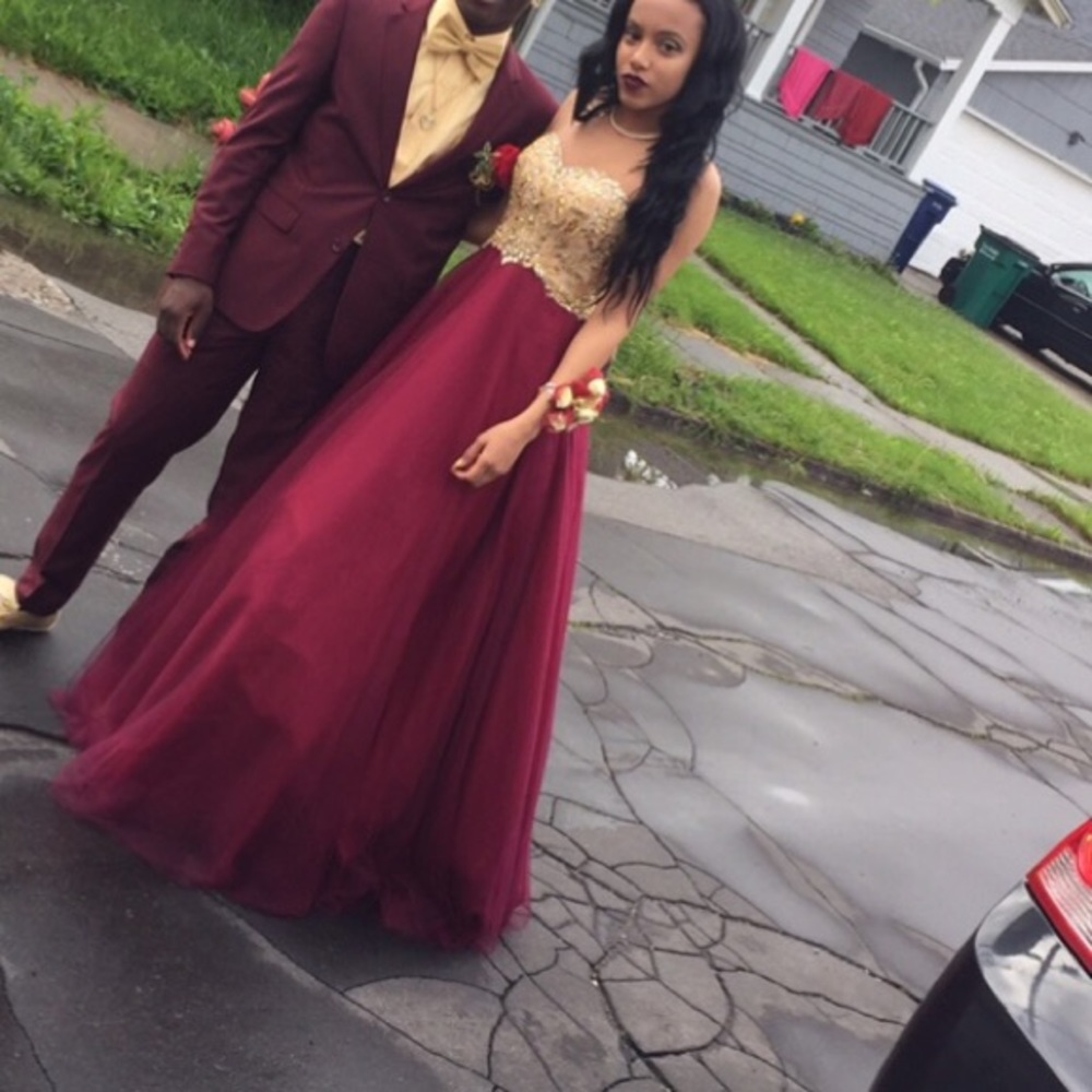 Beautiful burgundy and gold prom dress